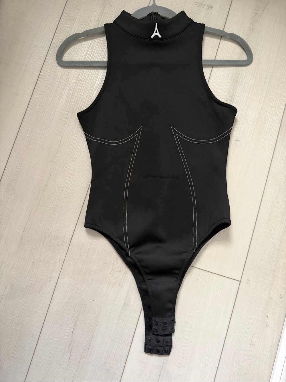 Women’s Black Sleeveless High-Neck Bodysuit